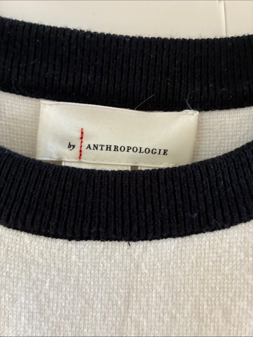 Anthropologie White Top with Black Trim and Ruffled Hem - Picture 2 of 2
